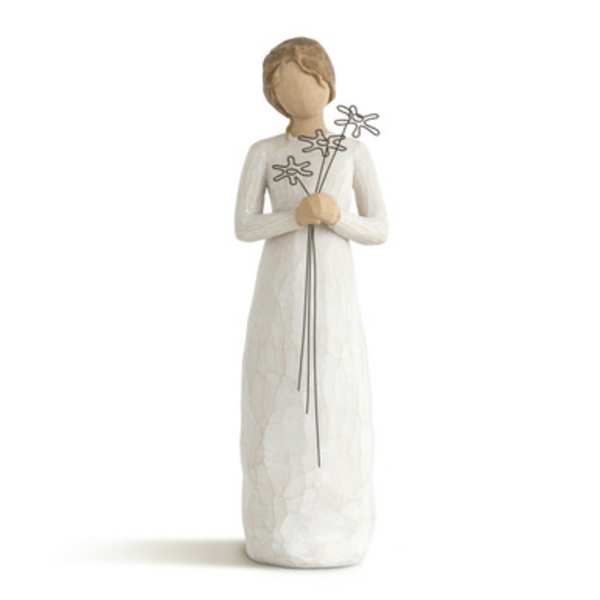 White figurine holding three wire flowers