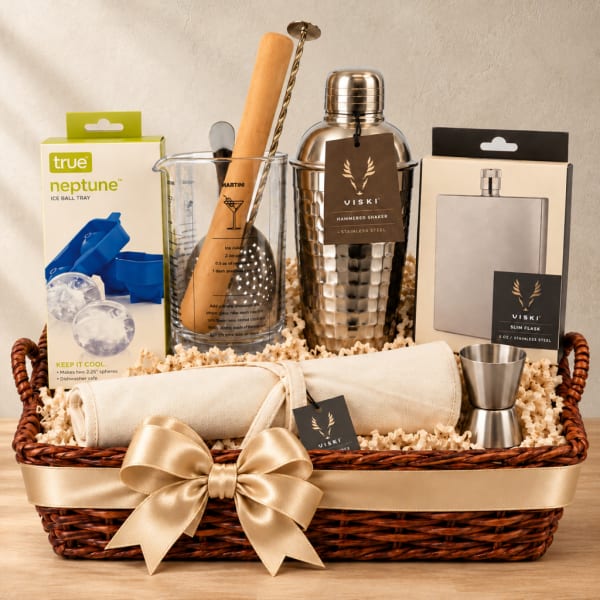 Gift basket with cocktail tools, flask, shaker, ice tray, and ribbon bow