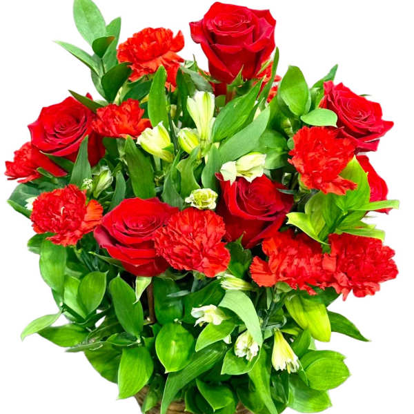 Red roses and carnations in a woven basket