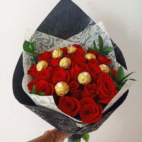 Wrapped bouquet of 24 Roses and Chocolates