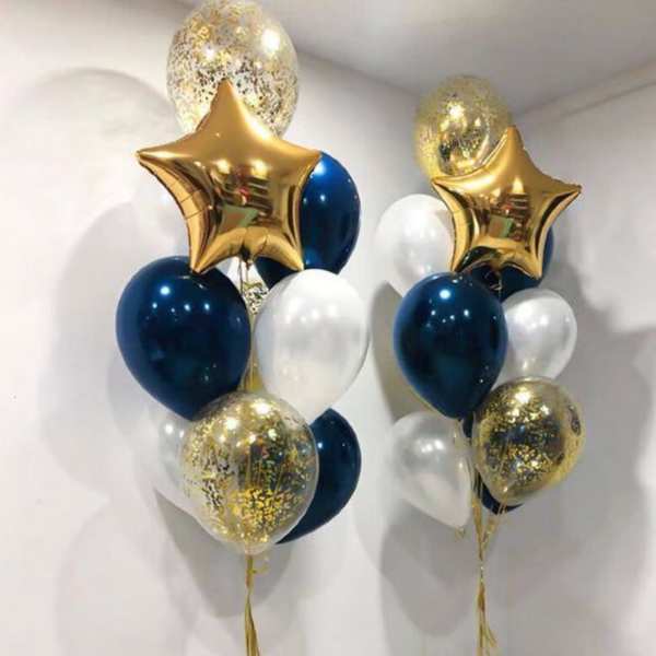 Two balloon bouquets with gold stars, navy, white, and confetti balloons
