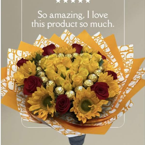 Bouquet of yellow roses, sunflowers, and red roses wrapped in orange paper
