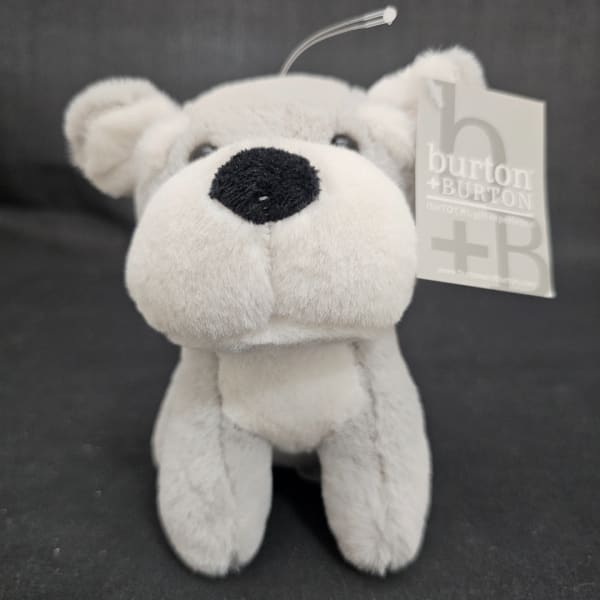 White plush teddy bear with a Burton + Burton tag