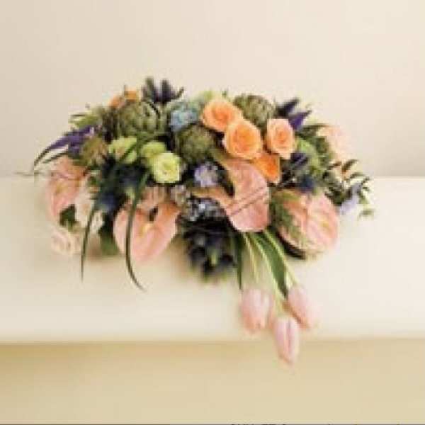 Mixed bouquet with peach, pink, and purple flowers