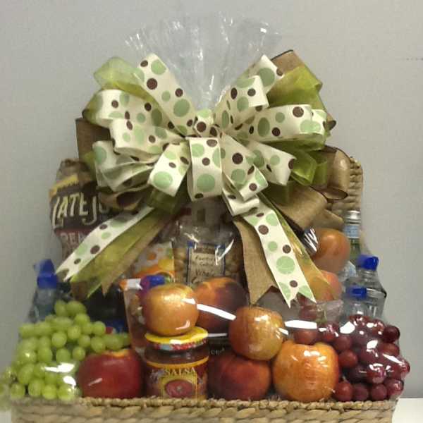 Fruit and snack gift basket with a large polka-dot bow