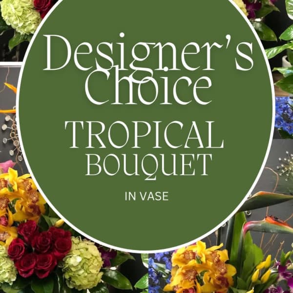 Designer’s choice tropical bouquet in a vase with orchids and roses
