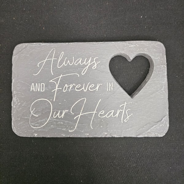 Gray memorial plaque with a heart cutout and the words Always and Forever in Our Hearts
