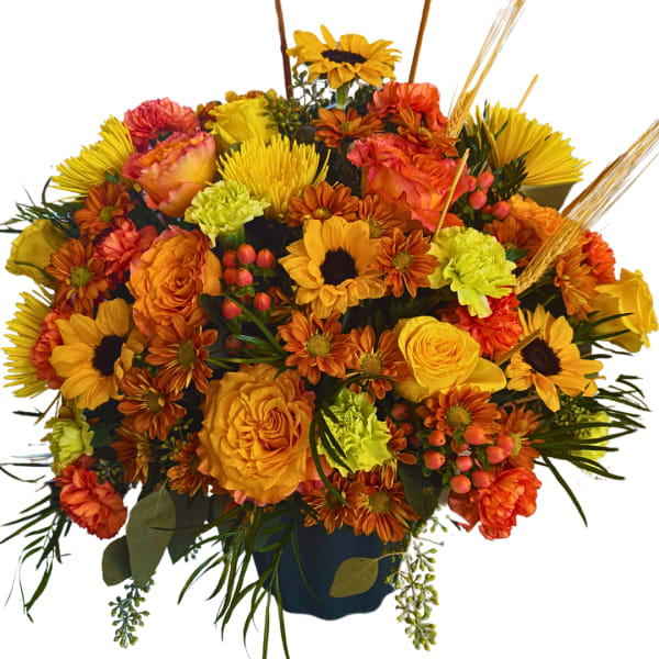 Orange and yellow mixed bouquet in a dark vase