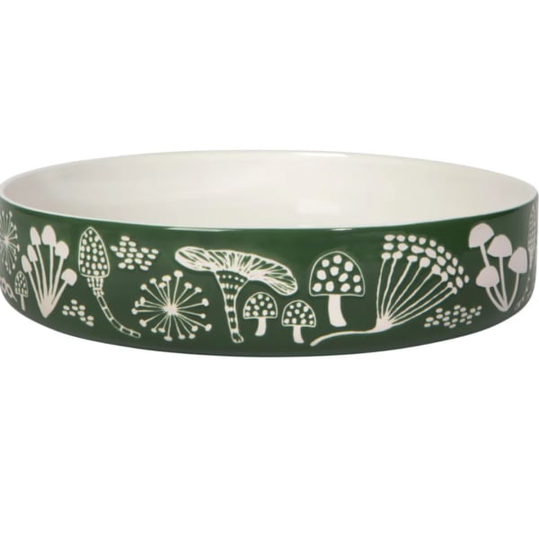 Green ceramic bowl with white mushroom illustrations