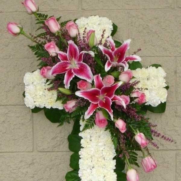 Cross with flowers for funerals.