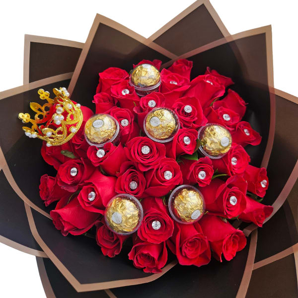 Red rose bouquet with Ferrero Rocher chocolates and a gold crown ornament