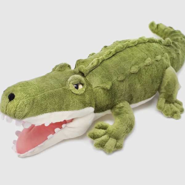 Green crocodile plush toy with open mouth
