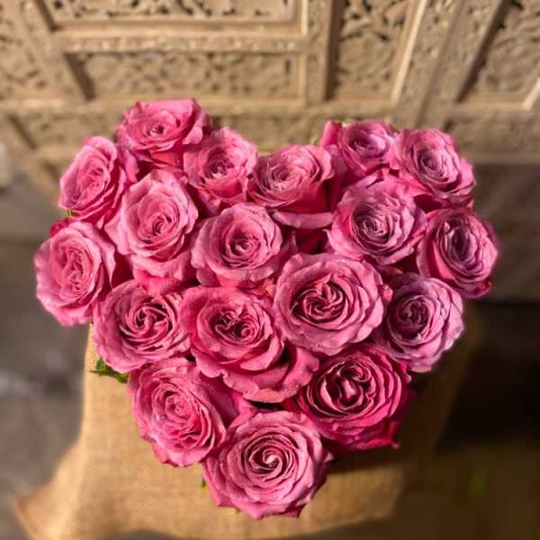 Heart-shaped bouquet of pink roses