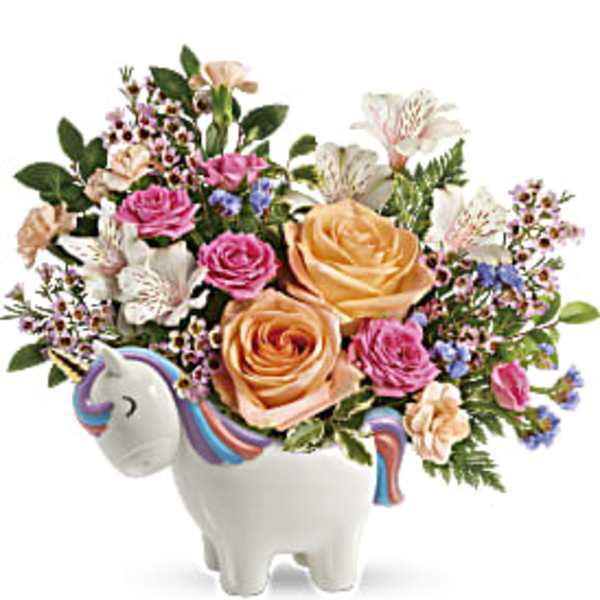 Floral arrangement in a unicorn-shaped ceramic container