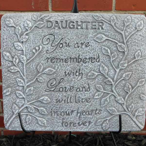 Decorative memorial plaque with leaf relief and the word Daughter.
