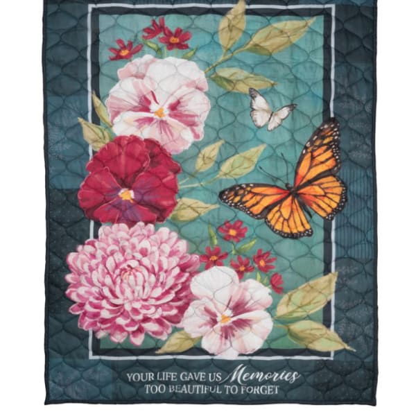 Quilted memorial blanket with pink flowers and butterflies