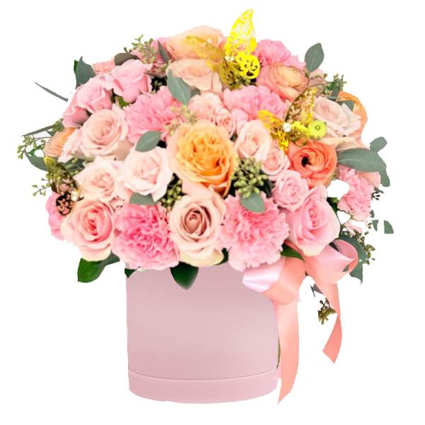 Pink and peach rose bouquet in a pink hatbox with ribbon