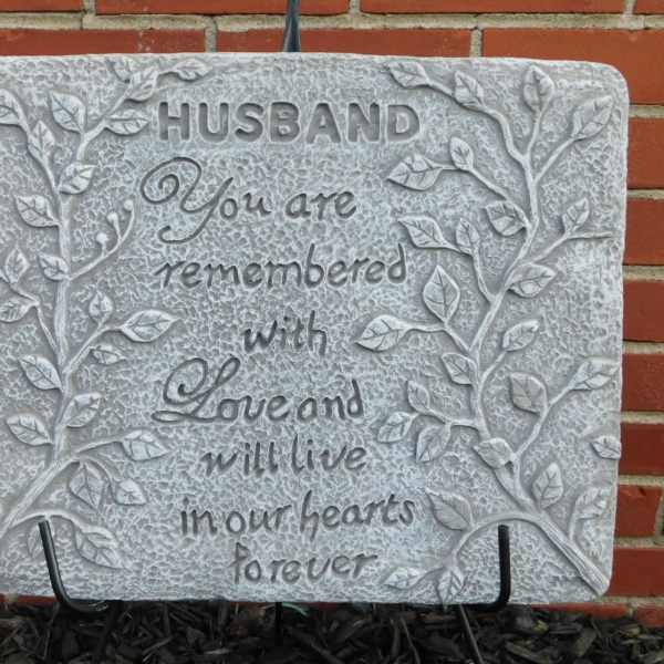 Decorative memorial plaque with the words "Husband, You are remembered with love and will live in our hearts forever."