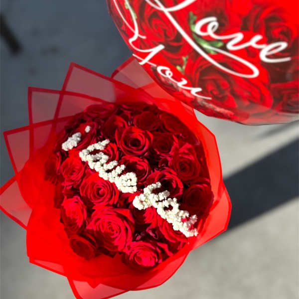 Red rose bouquet with white baby's breath and a heart balloon