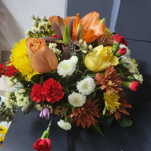 Rosas lily's carnation daisies