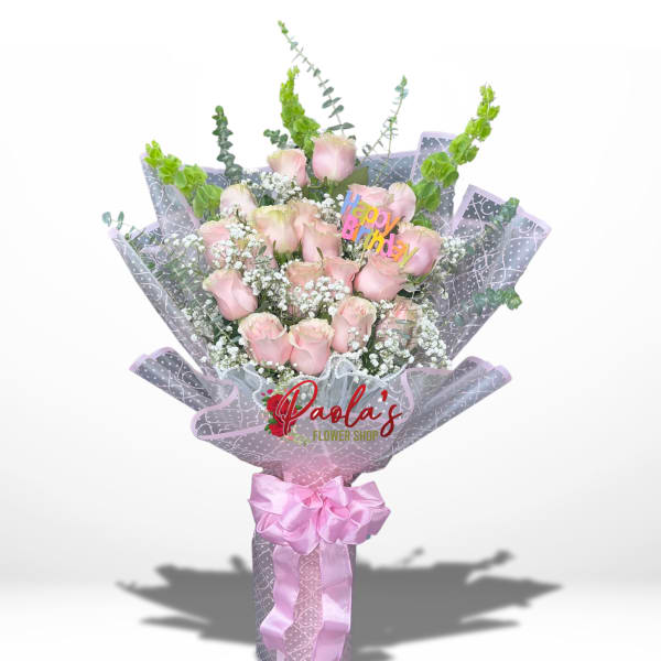 Pink rose bouquet with a birthday topper and pink ribbon