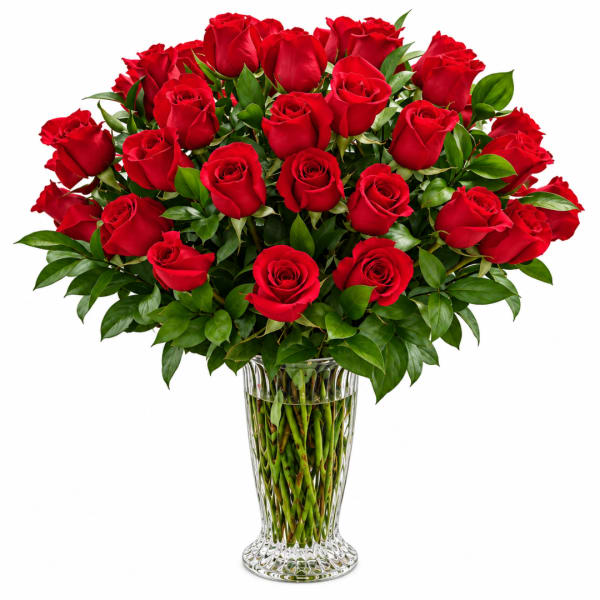 Bouquet of red roses in a clear glass vase