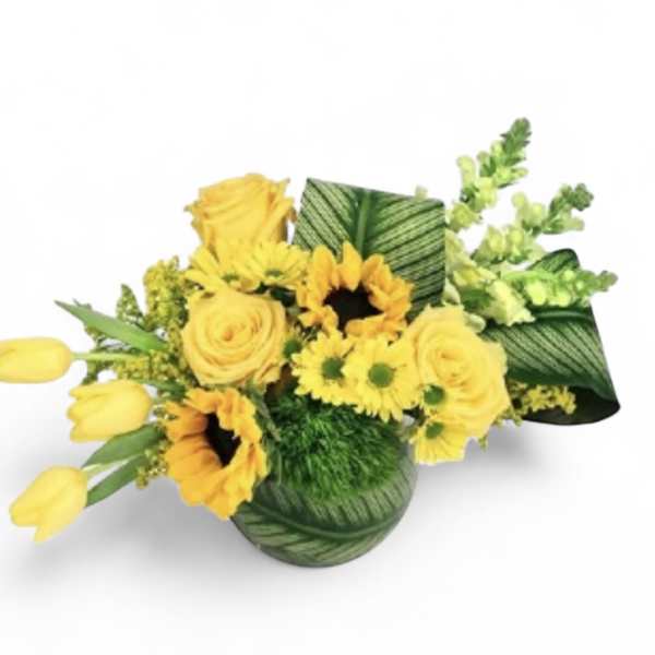 Yellow flowers arranged in a green patterned vase