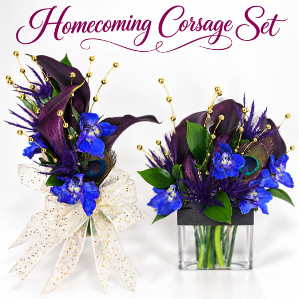 Two purple and blue corsage arrangements with gold accents and ribbon