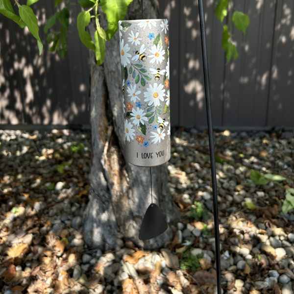 Decorative hanging wind chime with daisies and bees