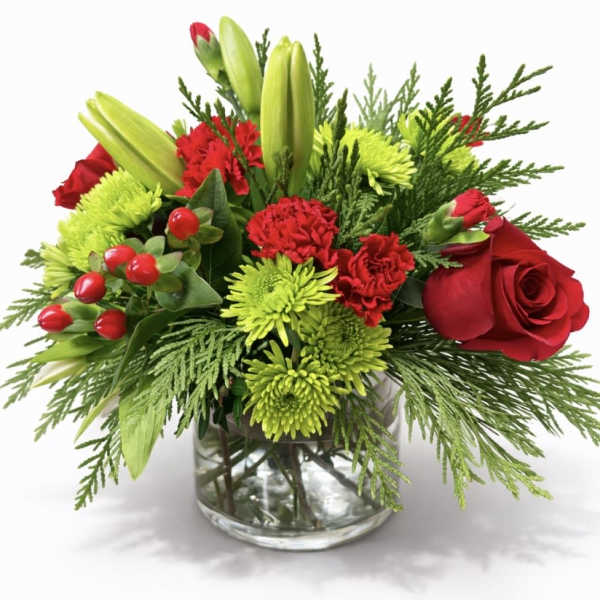 Red roses and green chrysanthemums in a glass vase