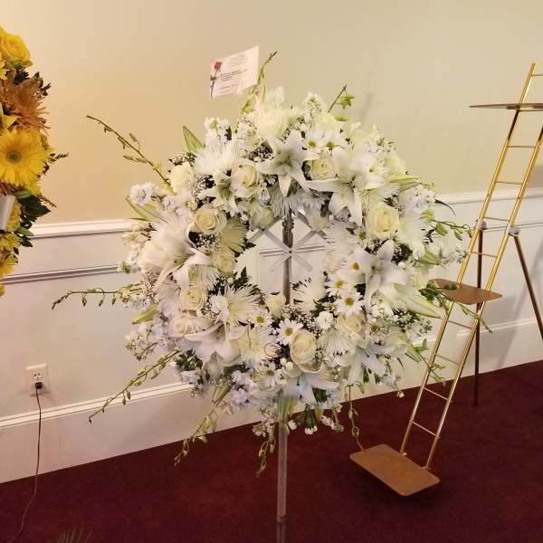 Memorial wreaths White. From Roma Florist