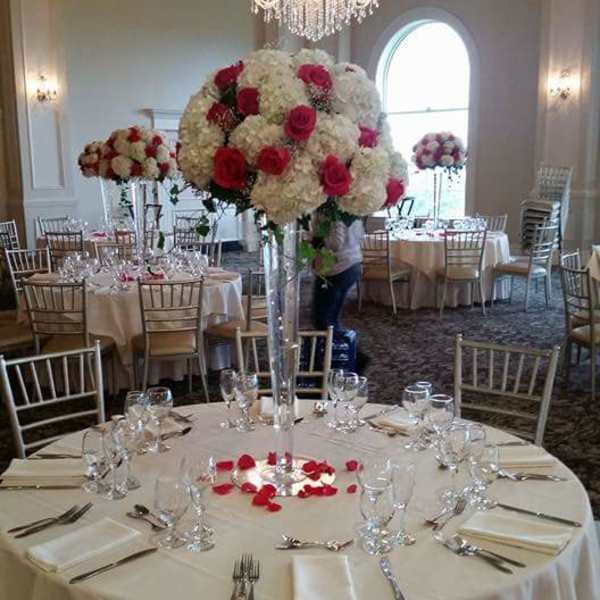 Withe and pink centerpieces From Roma Florist