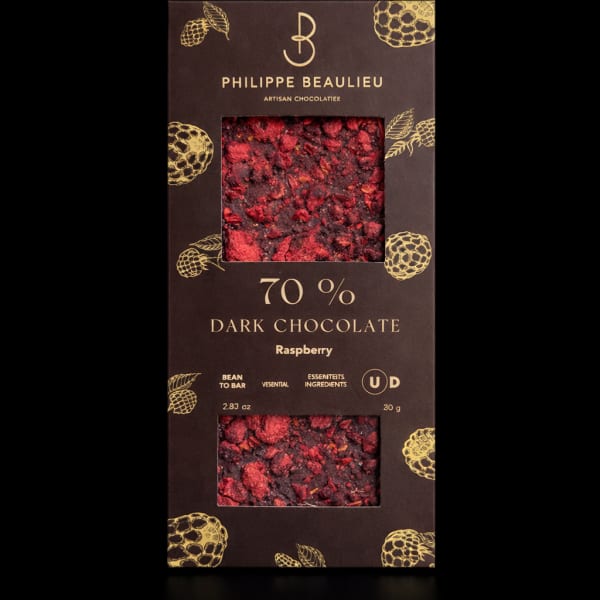 Box of dark chocolate raspberry bar with visible fruit pieces