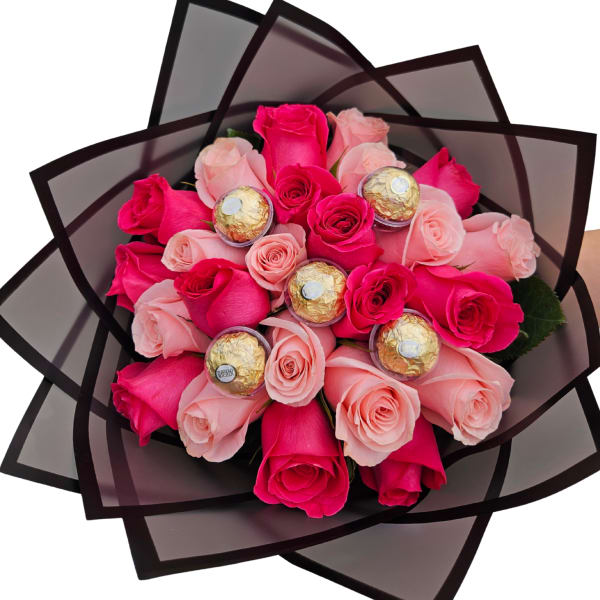 Bouquet of pink roses with Ferrero Rocher chocolates wrapped in dark paper