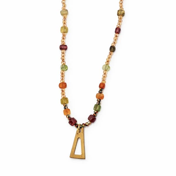 Beaded necklace with a gold pendant on a white background