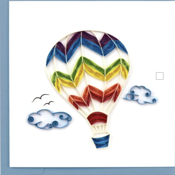 Colorful paper hot air balloon with clouds on a white card