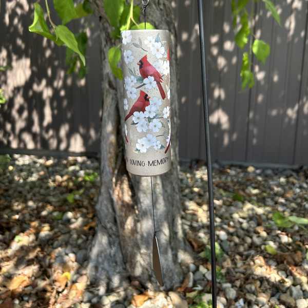 Cardinal memorial wind chime hanging outdoors