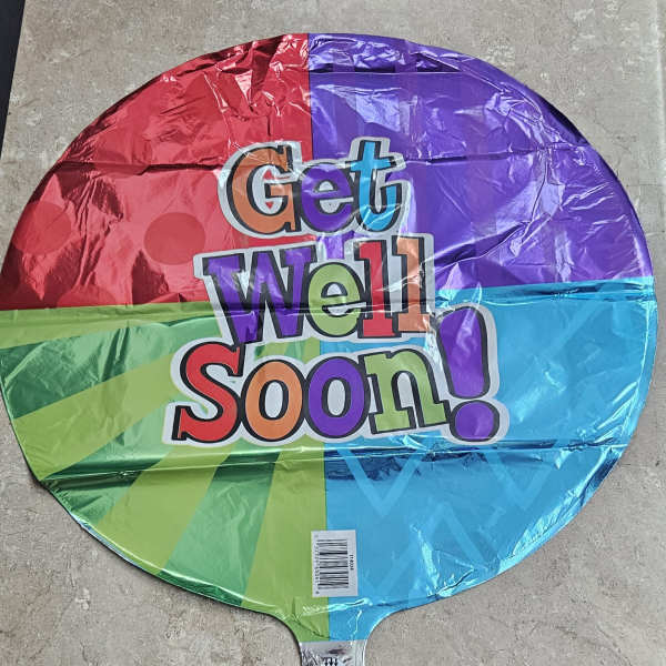 Round multicolor balloon with the words "Get Well Soon!"