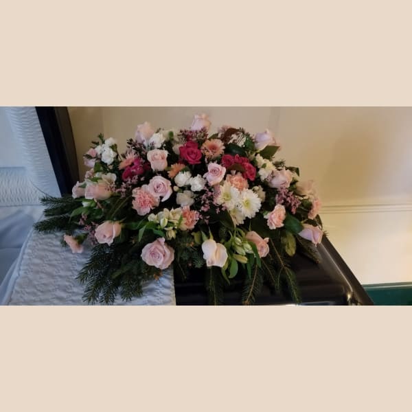Large pink and white floral spray with roses and carnations