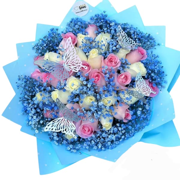 Bouquet of pink and white roses with blue baby's breath and butterfly accents