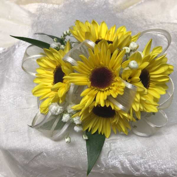 Yellow daisy bouquet with white ribbon and small white filler flowers