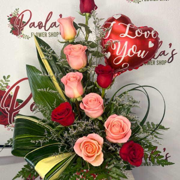 Red and pink roses arranged with a heart-shaped "I Love You" balloon