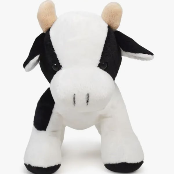 Black-and-white plush cow toy facing forward