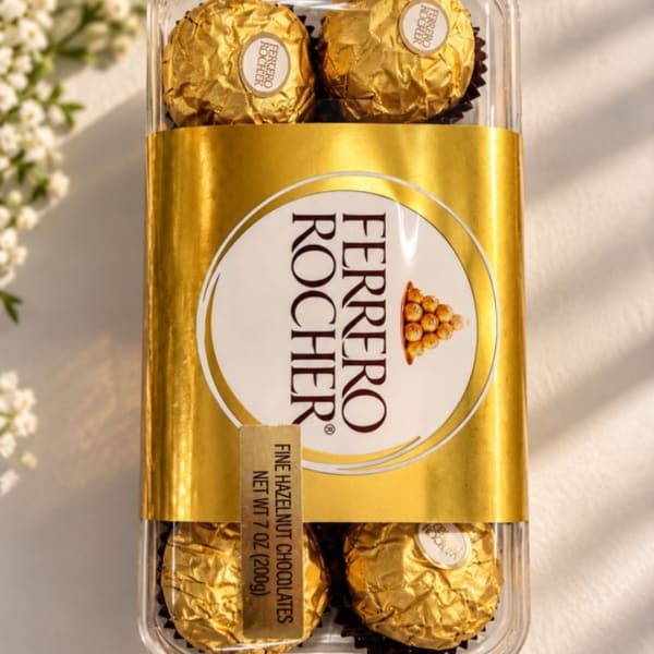 Box of Ferrero Rocher chocolates in gold wrappers