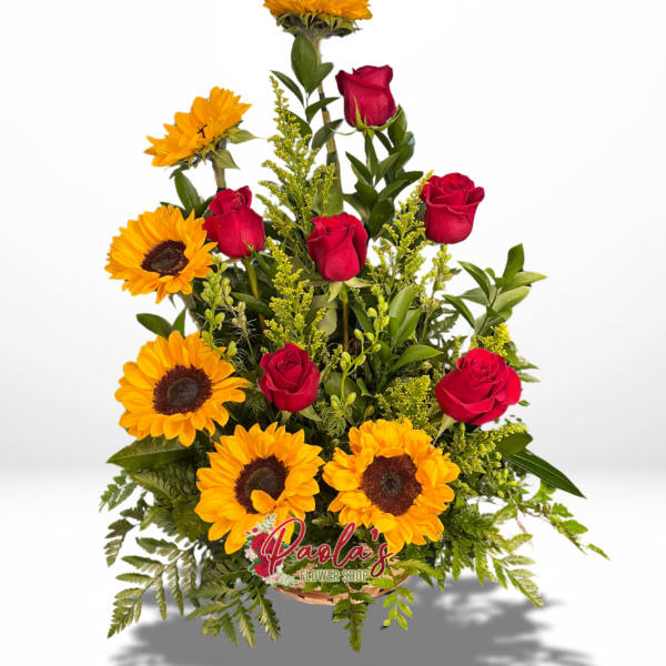 Sunflowers and red roses in a basket arrangement