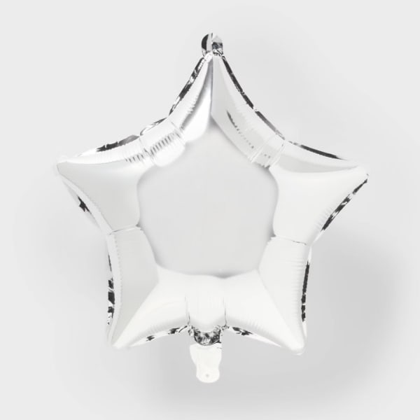 Silver star-shaped foil balloon on a white background