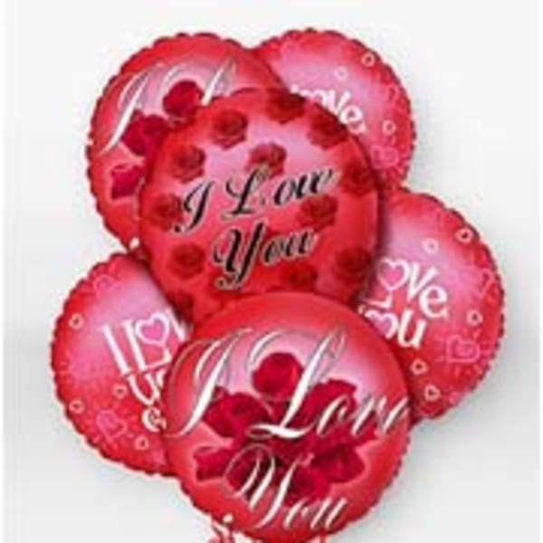 Cluster of red heart-shaped balloons with love messages