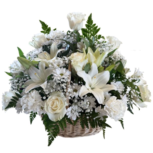 White floral basket arrangement with roses, lilies, and daisies