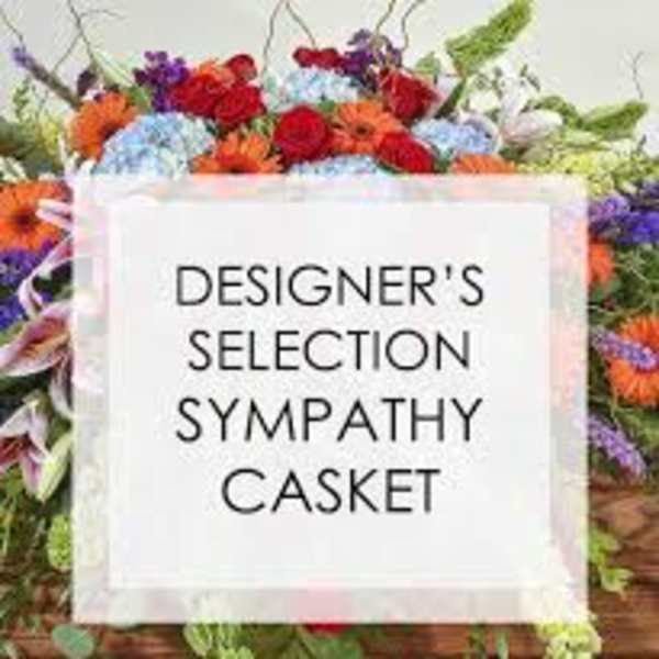 Sympathy casket spray with mixed colorful flowers