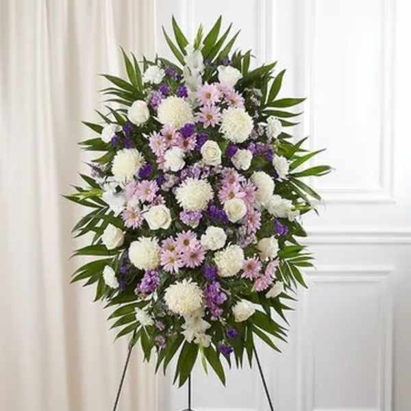 Standing floral spray with white, pink, and purple flowers